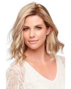 Woman in a 12" light blonde curly wiglet hair topper