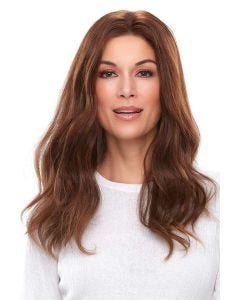 Woman in 18" wavy medium auburn lace front hair topper for thinning hair