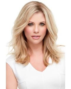 Woman in a 12" light blonde human hair topper