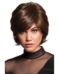 Woman in a chin length dark brown layered bob wig with side bangs