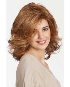 Woman in a past the shoulders layered light red wig