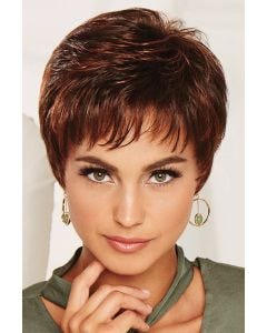 Woman in auburn short pixie wig with short bangs