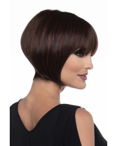 Woman in a straight chin length bob wig with blunt bangs