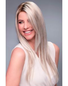 Woman in an extra long ash blonde lace front wig