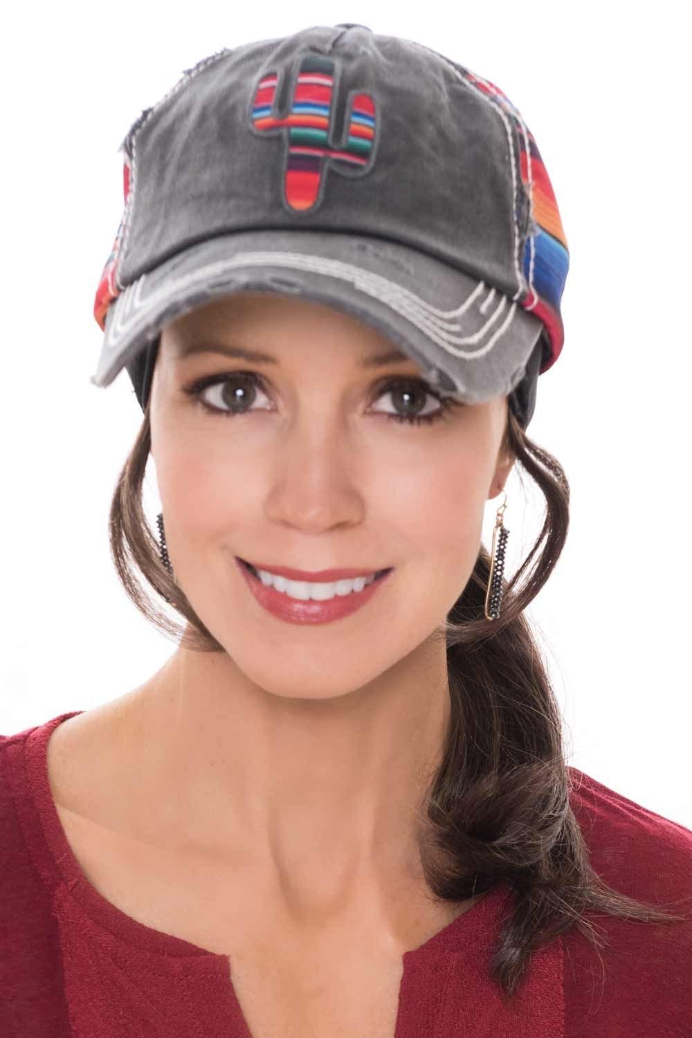 women in baseball hats