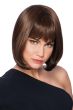 Woman in a straight chin length dark brown wig with blunt bangs
