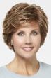 Woman in a short evenly layered red blonde bob wig with side bangs