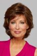 Woman in a past the chin dark auburn layered bob wig with layers throughout and wispy bangs