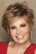 Raquel Welch in short, layered, light auburn bob wig with extra volume in the crown area and textured bangs