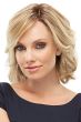 Woman in a short, blonde wavy lace front bob wig with side swept bangs