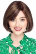 Woman in straight brown synthetic bob wig with bangs