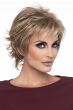 Woman in a short textured light brown wig
