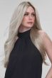 Woman in an extra long platinum blonde lace front wig with face framing layers