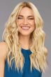 Woman in an extra long dark auburn remy human hair wig