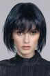 Woman in a chin length platinum blonde bob wig with textured bangs