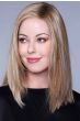 Woman in a past the shoulders warm blonde straight lace front wig