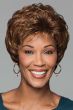 Afro American woman in short, curly, reddish brown pixie wig