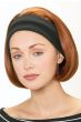 Woman in auburn bob cut wig with black headband attached