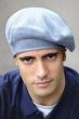 Man in blue cotton beret