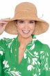 Woman in wide brimmed braided straw sun hat for spring and summer for women