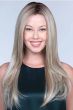 Woman in an extra long ash blonde lace front wig