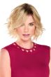 Woman in an 8" medium brown curly heat resistant hair topper for thinning hair