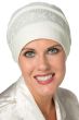 Woman in cream ribbed sleep cap or hat with embroidered band for chemo patients