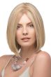 Woman in a shoulder length curled under dark blonde blunt human hair bob wig