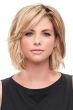 Woman in a 6" to 8" blonde hair topper for thinning hair