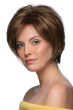 Woman in a chin length chestnut brown layered bob wig with side bangs