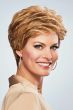 Woman in a warm blonde pixie wig with longer hair on the top and sides