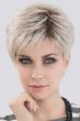 Woman in an edgy light blonde layered lace front pixie wig with bangs