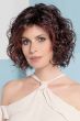 Woman in a past the chin violet curly lace front wig
