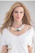 Woman in an extra long medium blonde layered lace front wig