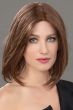 Woman in a 12.5" straight medium auburn human hair topper for thinning hair