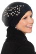 Woman in cute black winter beanie hat with slouchy back and embellished beading on the sides for cancer patients
