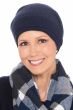 Woman in cute blue winter beanie hat with shimmery accents