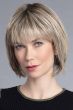 Woman in a 5.5" to 9.75" light brown hair topper for thinning hair