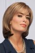 Woman in straight, shoulder length light brown bob lace front wig with bangs