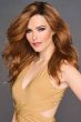 Woman in an extra long medium brown wavy lace front wig with long layers