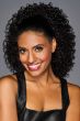 Woman in a 16" curled cinched ponytail extension hair piece