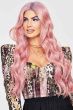 Woman in an extra long lavender wavy lace front wig