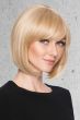 Woman in a 4.5" to 10.5" light blonde hair topper for thinning hair