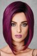 Woman in an shoulder length deep purple angled bob wig with dark roots