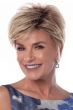 Short feathered pixie layers and side-swept bangs.