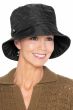 Woman in black classic quilted bucket rain hat with fleece lining