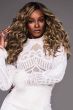 Afro American woman in an extra long curly medium brown lace front wig