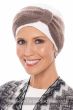 Woman in a white Three Seam Turban with a taupe knit bow headband on top