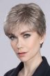 Woman in a cropped platinum blonde pixie wig