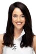 Woman in a 12" black straight human wiglet for thinning hair